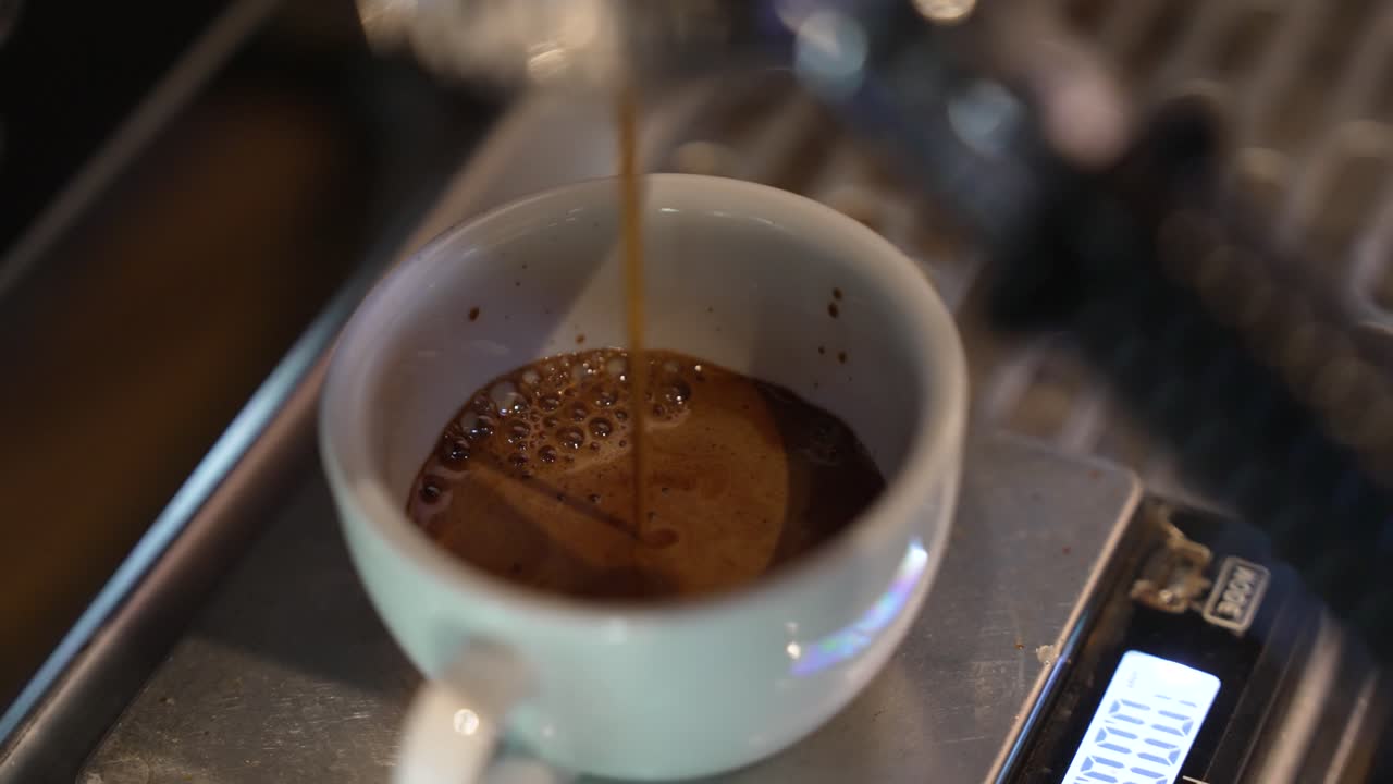 Pour over coffee drips steadily through the filter during brewing