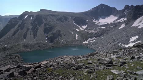 majestic mountain and lake views of washakie pass in wyoming’s wind river range, with stunning alpine scenery, pan from boulder field