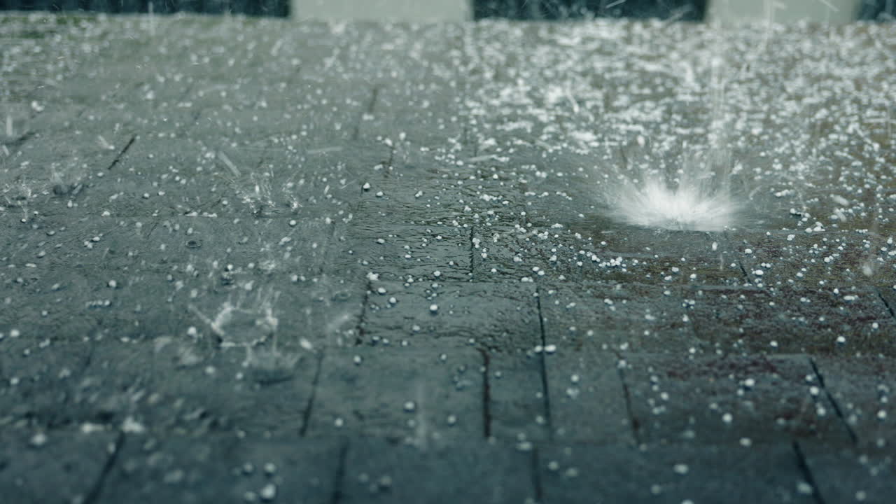 Hailstorm on a paved surface
