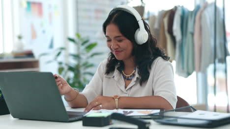 Music,-laptop-and-business-woman-writing-at-desk