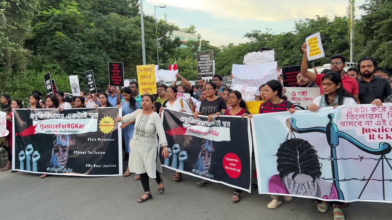 People with banners against rape protesting during morning in Kolkata, India. RG Kar murder case.