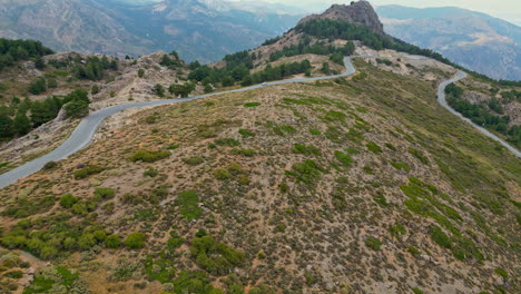 Drone-Captures-Winding-Road-in-Sierra-Nevada-National-Park,-Spain