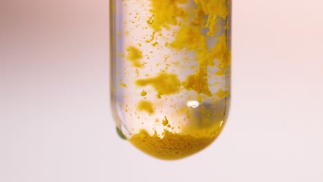 yellow precipitate forms in clear liquid solution