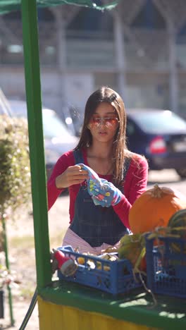 woman selling produce at an outdoor market