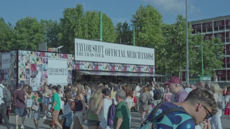 taylor swift the eras tour: fans queue for official merchandise