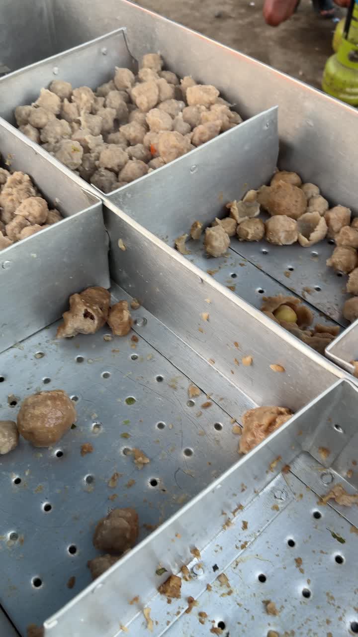 Steaming Meatballs and Stuffed Tofu at a Street Food Stall