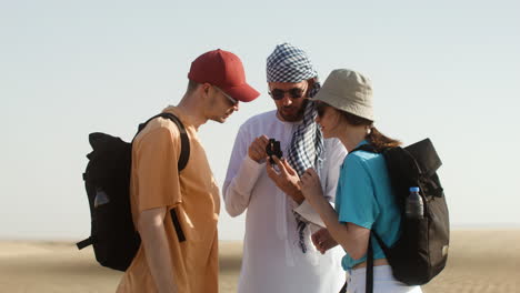 three travelers in the desert