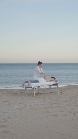 massage on the beach by the ocean