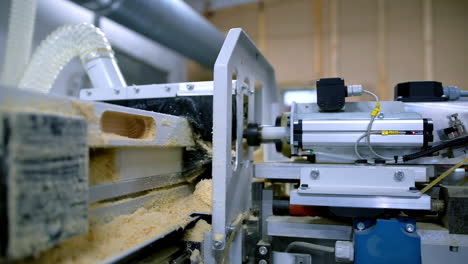 production of doors. making wooden doors on the automated machine tool. modern equipment in workshop for the production of doors. close-up.
