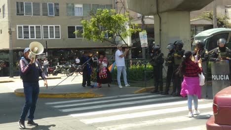 protest in peru: indigenous people and police face-off in the streets