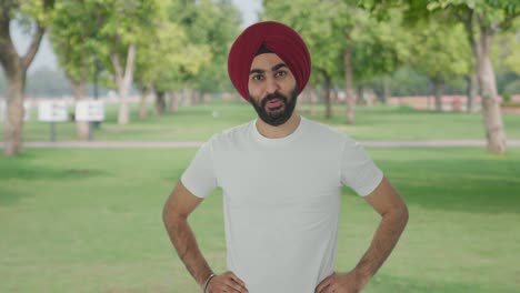 Happy-Sikh-Indian-man-getting-a-surprise-in-park