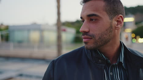 Young-man-looking-pensive-to-the-views-outdoors.