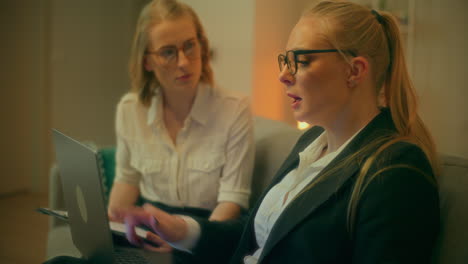 two women discuss new project strategy