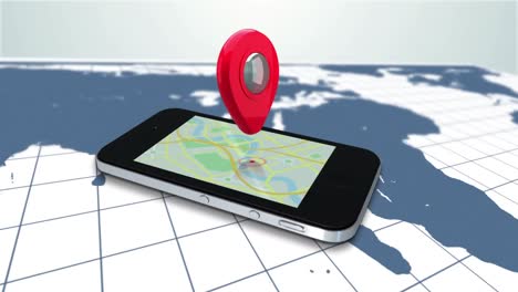 móvil acostado en un mapa haciendo zoom en un marcador rojo