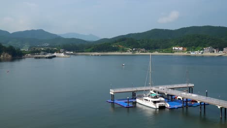 catamaran boat moored in the jetty of a resort in geojedo island in south korea