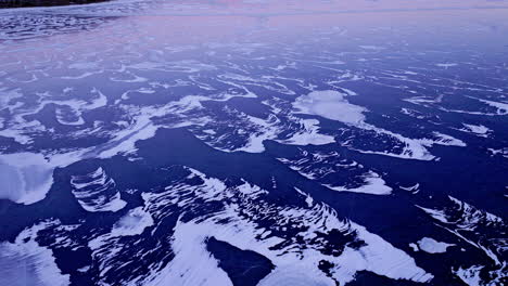 spectacular drone footage of immense ice floes on the water's surface