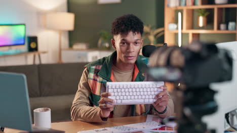 man reviewing keyboard in home studio