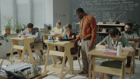 diverse group of students and teacher in a classroom setting