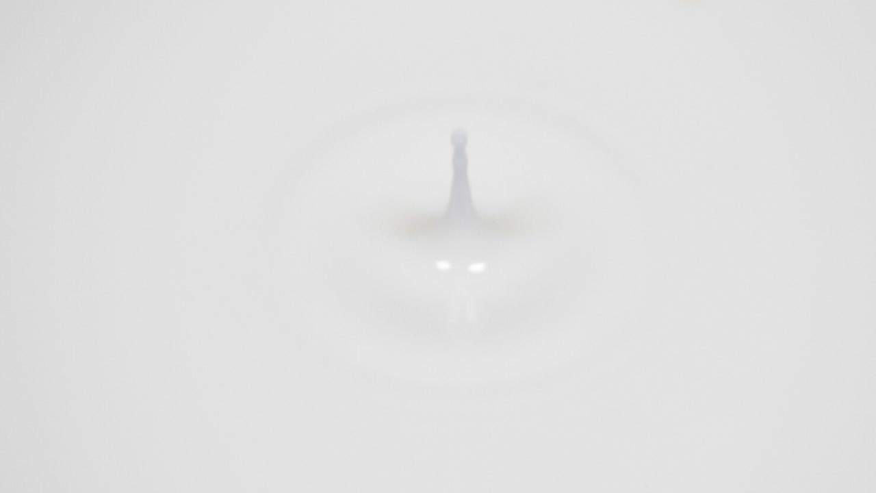 Drop of Milk Falling, Slow Motion 4K