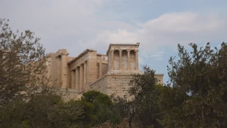 ancient temple surrounded by trees and sky