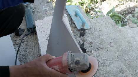 grinding ceramic tiles to be installed on the floor of the house