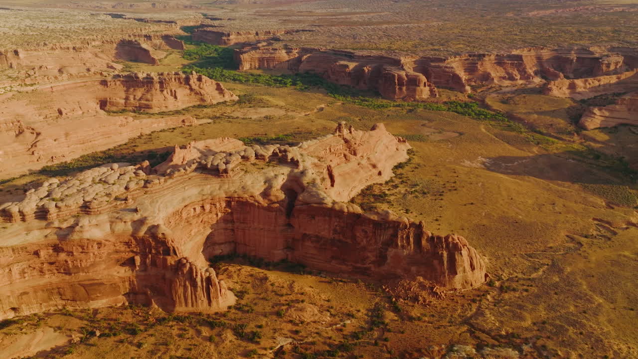 Wonderful canyons and desert lands in Utah, USA. Stunning panorama of rocky landscape on sunny daytime.