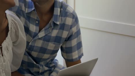 Young-couple-using-laptop