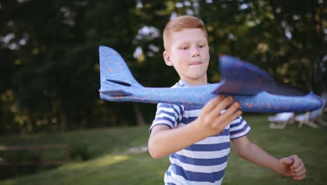 Video-of-little-boy-have-fun-during-playing-a-plane