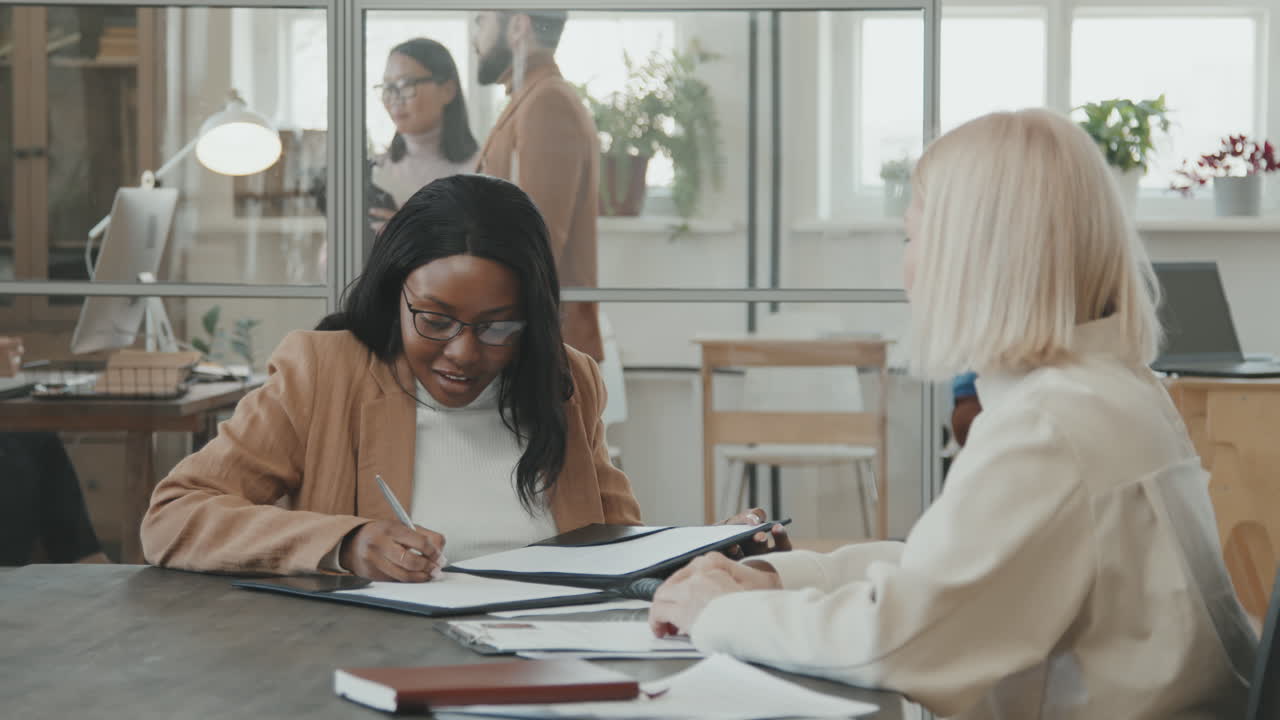 Happy African-American Woman Singing Document in Meeting