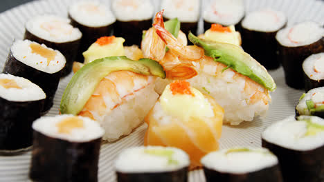 various sushi served on plate