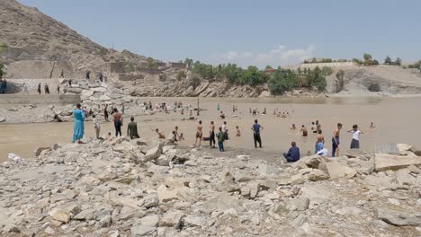 kids splashing in the river