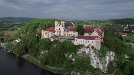 aerial shot of benedictine abbey, historic hilltop in tyniec