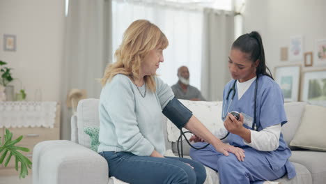 Nurse,-appointment-and-blood-pressure-with-senior