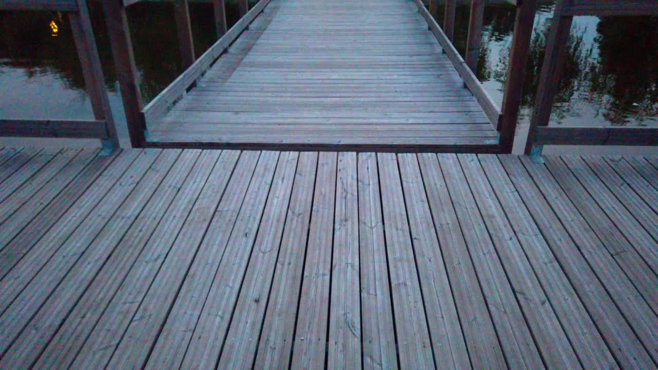 Walking on a pontoon on lake