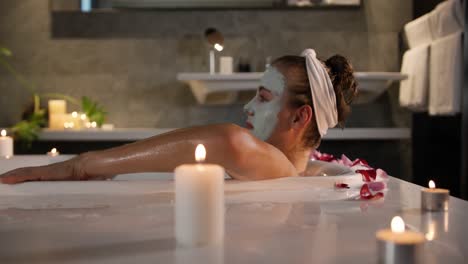 Caucasian-woman-taking-bath-in-hotel