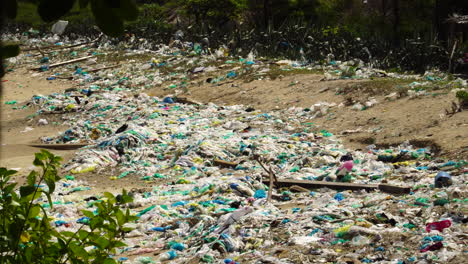 beach full of trash and garbage causing severe environment degradation