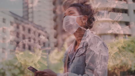 animation of covid 19 cells moving over woman in face mask