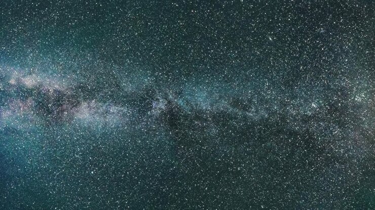 Travel through the starry space inside the blue Andromeda galaxy