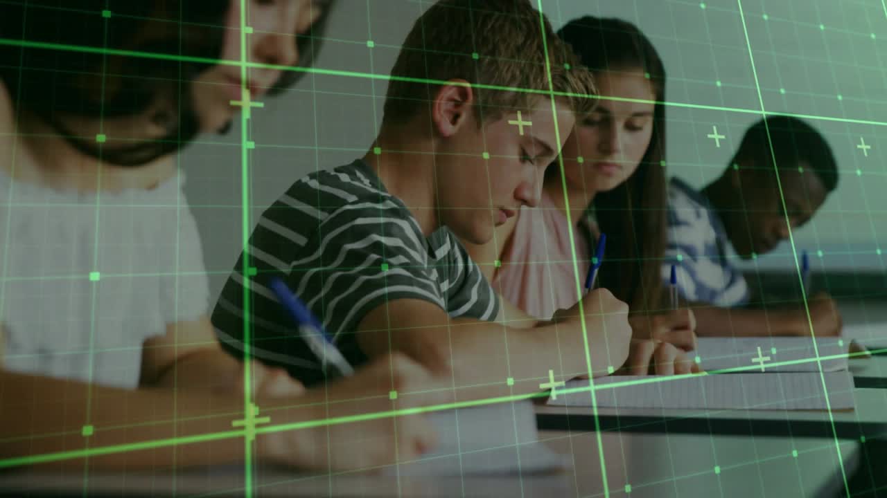 Camera pulling and panning right, student writing under green grid while classroom students writing