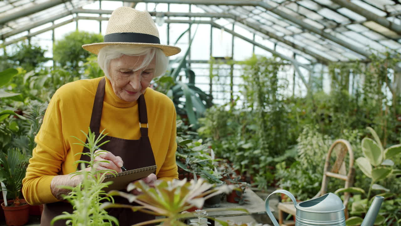 Grandmother and Granddaughter in Greenhouse