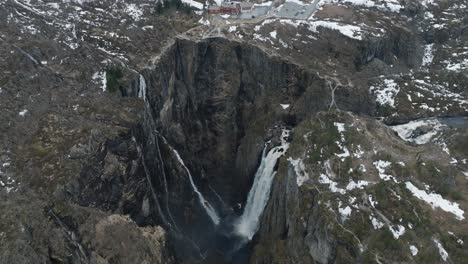 long drone shot of voringfossen waterfall, scenic spot and attraction in vestland, norway