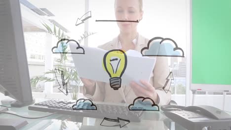 Animation-of-cloud-icons-and-lightbulb-over-caucasian-businesswoman-with-documents