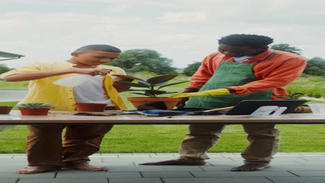 father and son gardening together