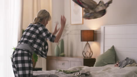 woman in pajamas in bedroom