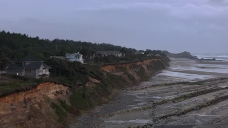 Capture-the-magic-of-Oregon's-storied-beaches-with-this-right-dolly-aerial-shot,-revealing-sweeping-coastal-views,-dramatic-waves,-and-the-rugged-beauty-of-the-Pacific-shoreline