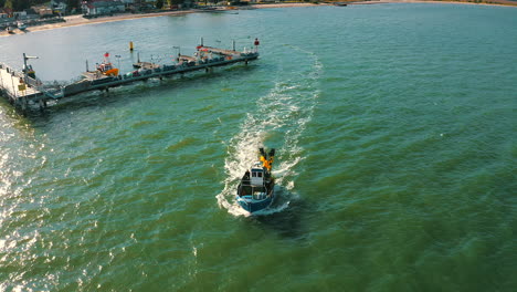 aerial view of fishing boat on the blue waters of baltic sea