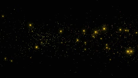 gold glitter particles on black and green background