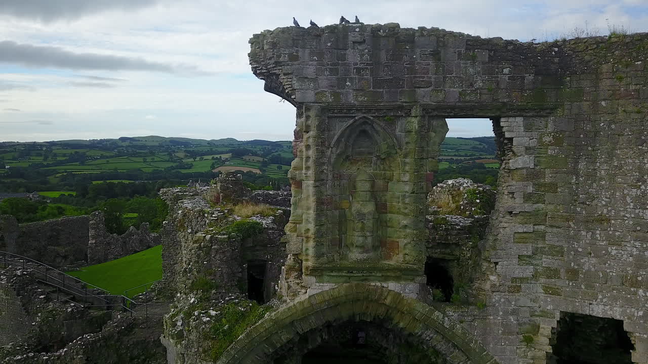 Denbigh Castle and town walls were a set of fortifications built to control the lordship of Denbigh after the conquest of Wales by King