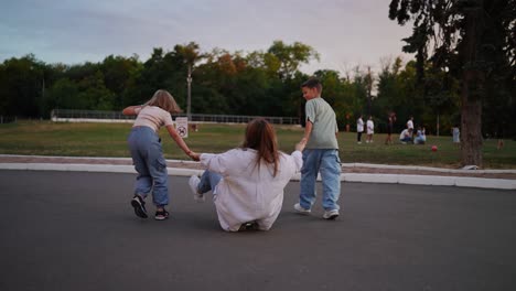 family fun in the park at sunset