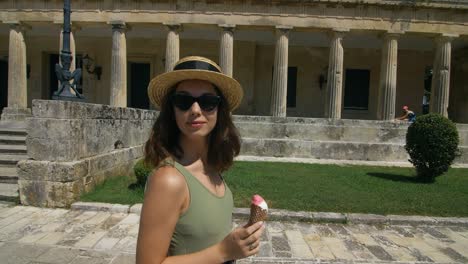 Tourist-woman-walking-at-ancient-city-at-sunny-day.-Woman-traveling-at-vacation